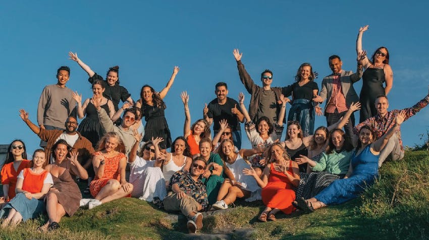 Intern Abroad HQ team members together at the beach on a clear summer evening