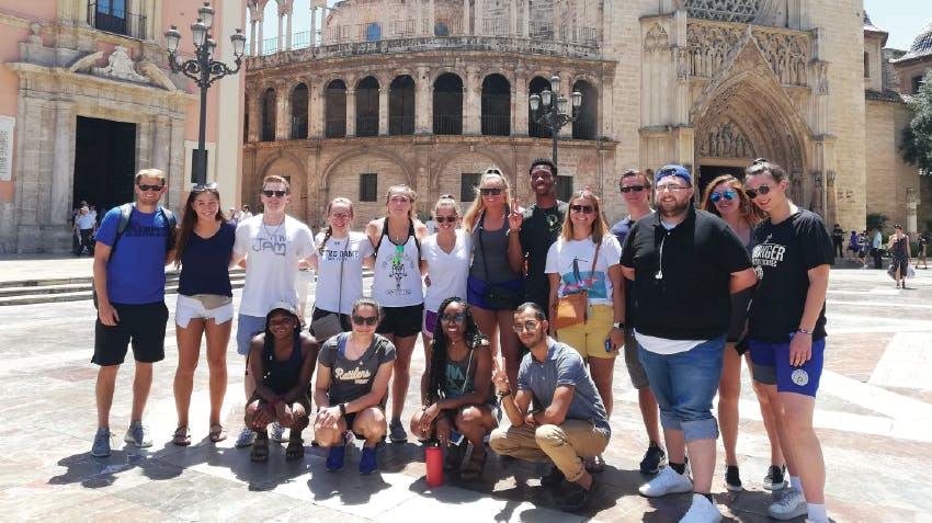 Group of interns posing together in Valencia, Spain