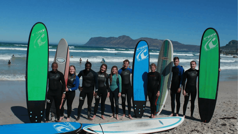 Interns learn to surf in South Africa