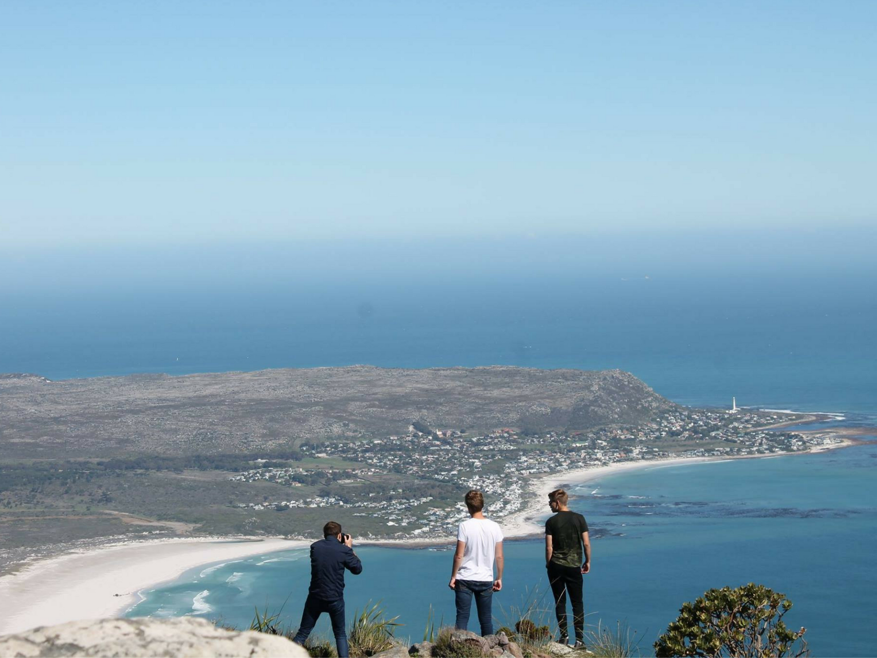 Internship students overlook the ocean South Africa