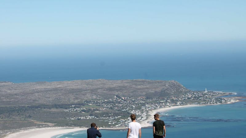 Internship students overlook the ocean South Africa