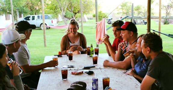 Internship students enjoy a game of cards in Cape Town