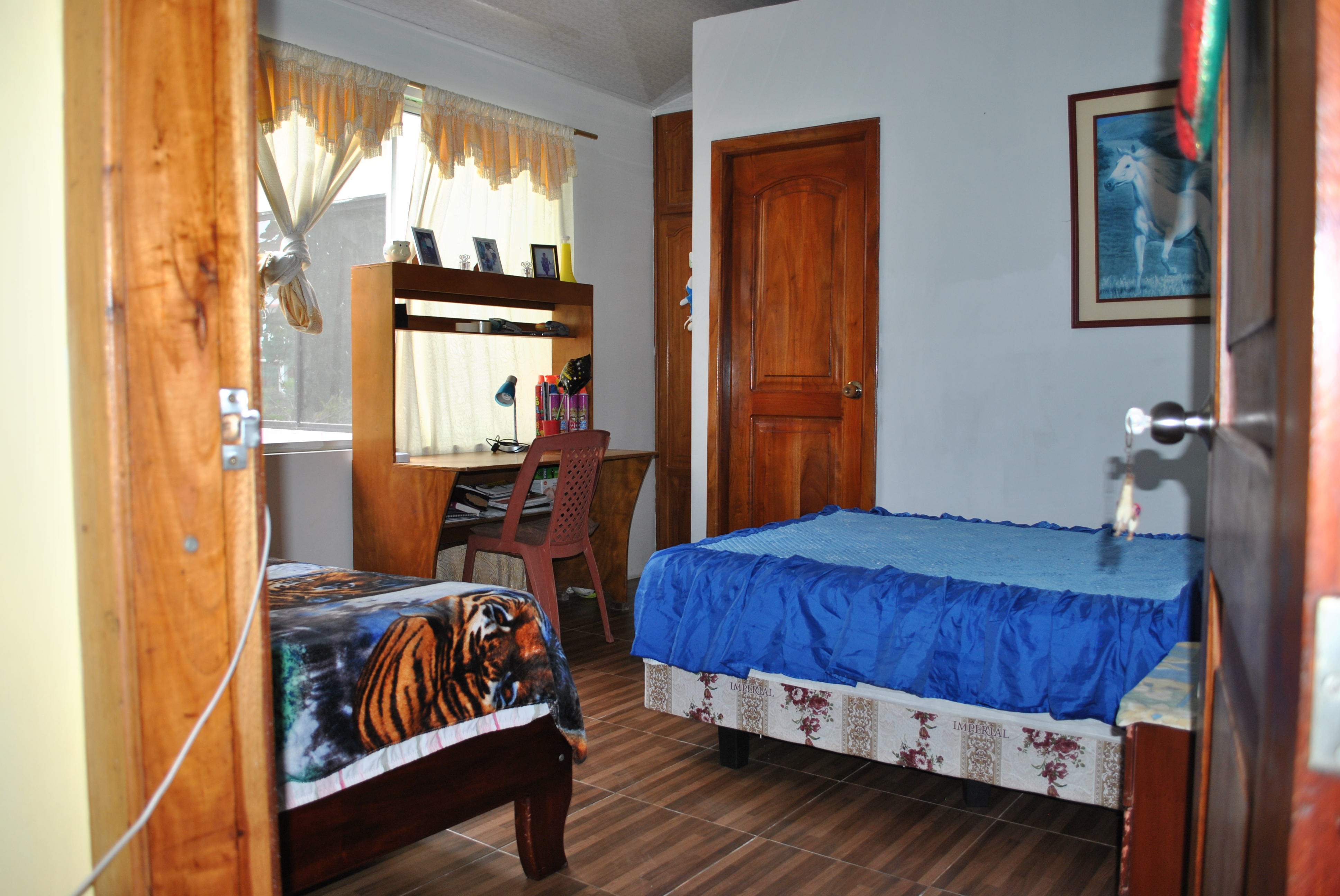 Example photographs of the homestay experience for internships in the Galapagos, Isabela Island, example guest bedroom