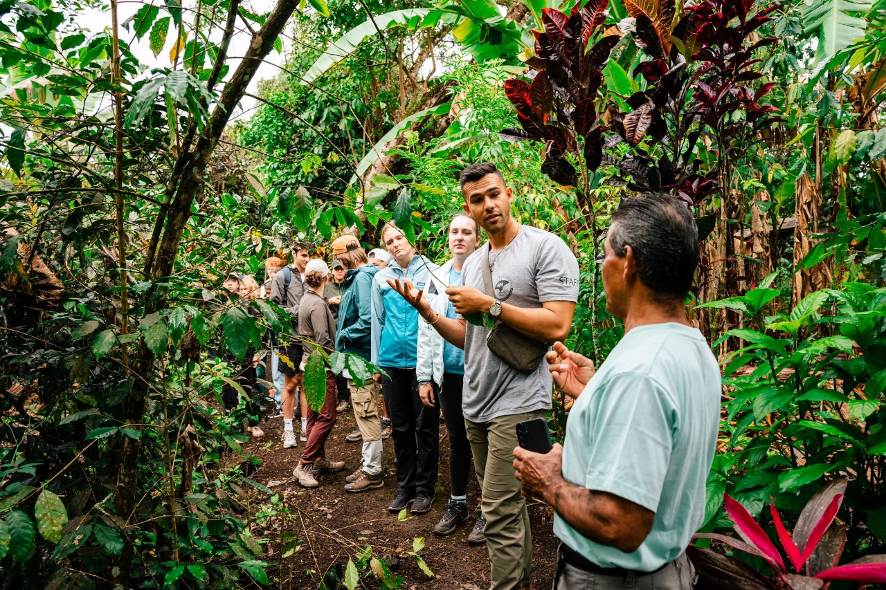 Sustainability internship participants visiting the coffee farmer's farm
