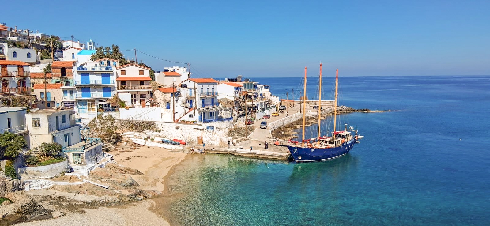 Marine Conservation Research Expedition photo showing the boat docked within the township