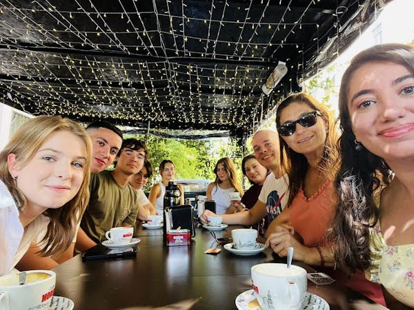 Interns sharing coffee in Rome, Intern Abroad HQ