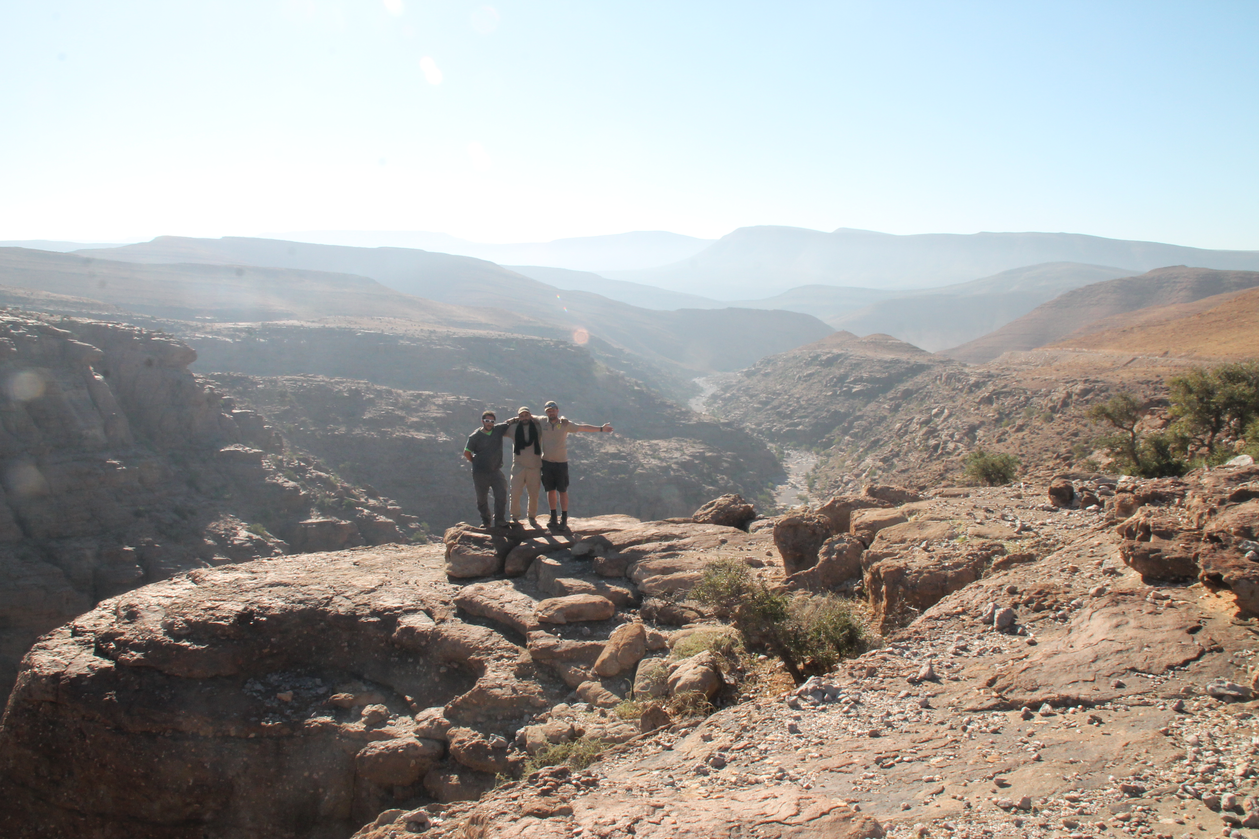 People posing in a valley in Morocco