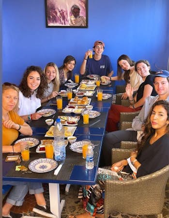 Interns dining together in Morocco, Intern Abroad HQ