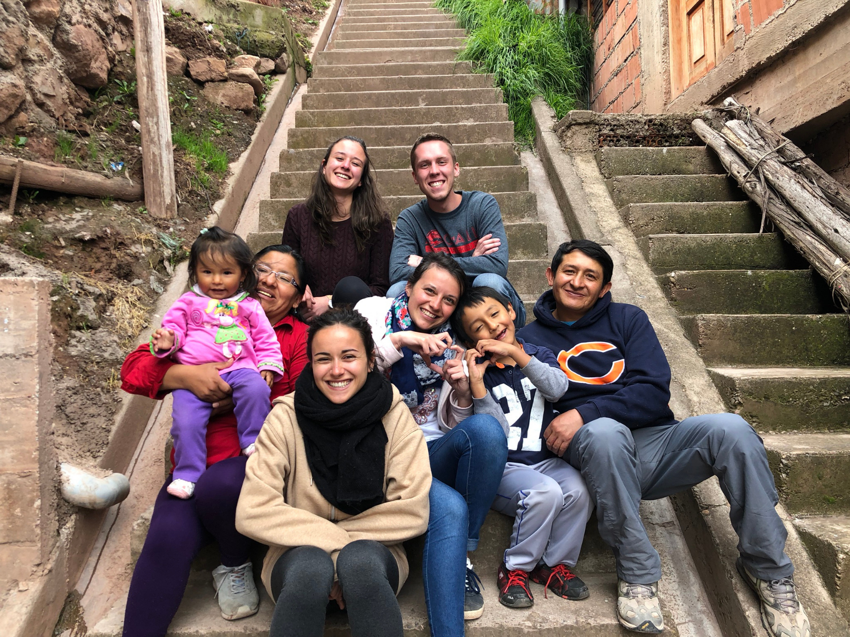 Intern with host family and friends in Cusco