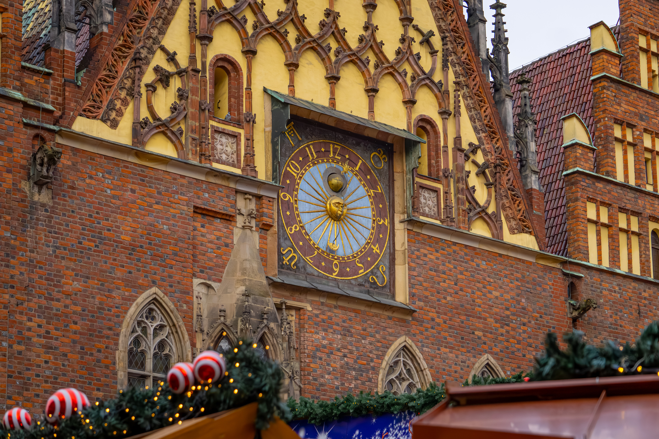 View of the 1580 astronomical clock, old town hall, Wroclaw, Poland, Christmas time