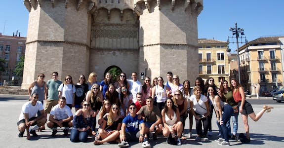 Interns in front of castle in Valencia